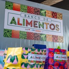 Imagem do logotipo do Banco de Alimentos da Comlurb na Cidade de Deus